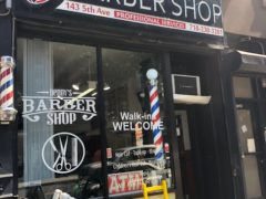 Store front of Benny's Barber Shop